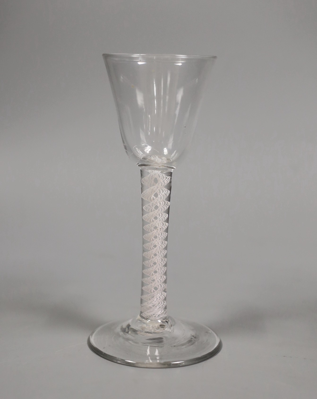 An 18th century double series opaque twist stem glass, 14.5cm tall